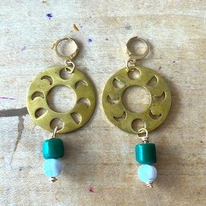 Gold moon phase dangle earrings with howlite and green stones